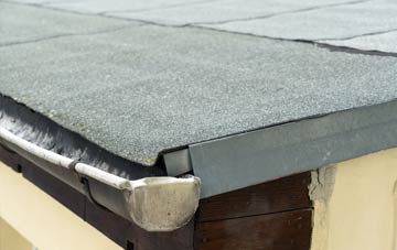 repair or replace Woodston flat roofing?